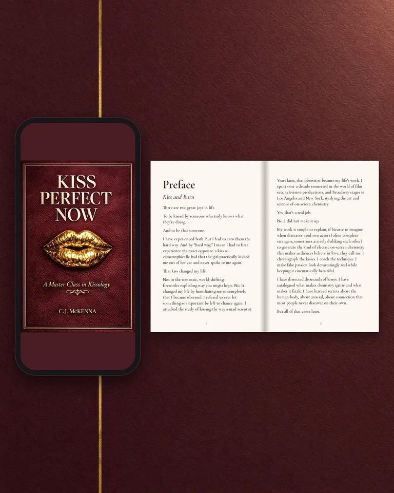 The Kiss Perfect Now ebook on a phone screen next to an open two-page spread of the book, on a deep wine backdrop with a gold hairline